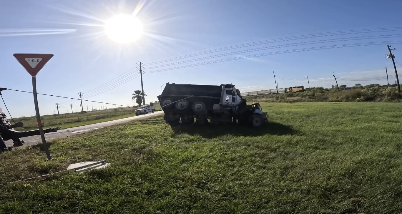 Truck being winched out of a ditch near Bethpage, NY